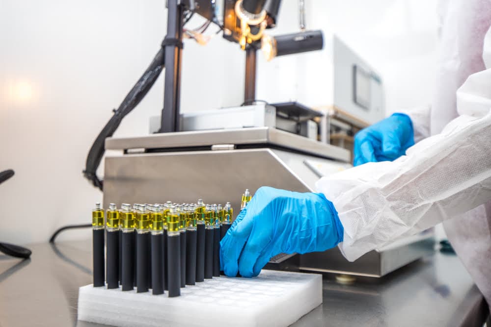 White label cannabis vape cartridge filling line at JIT Distro's licensed California facility